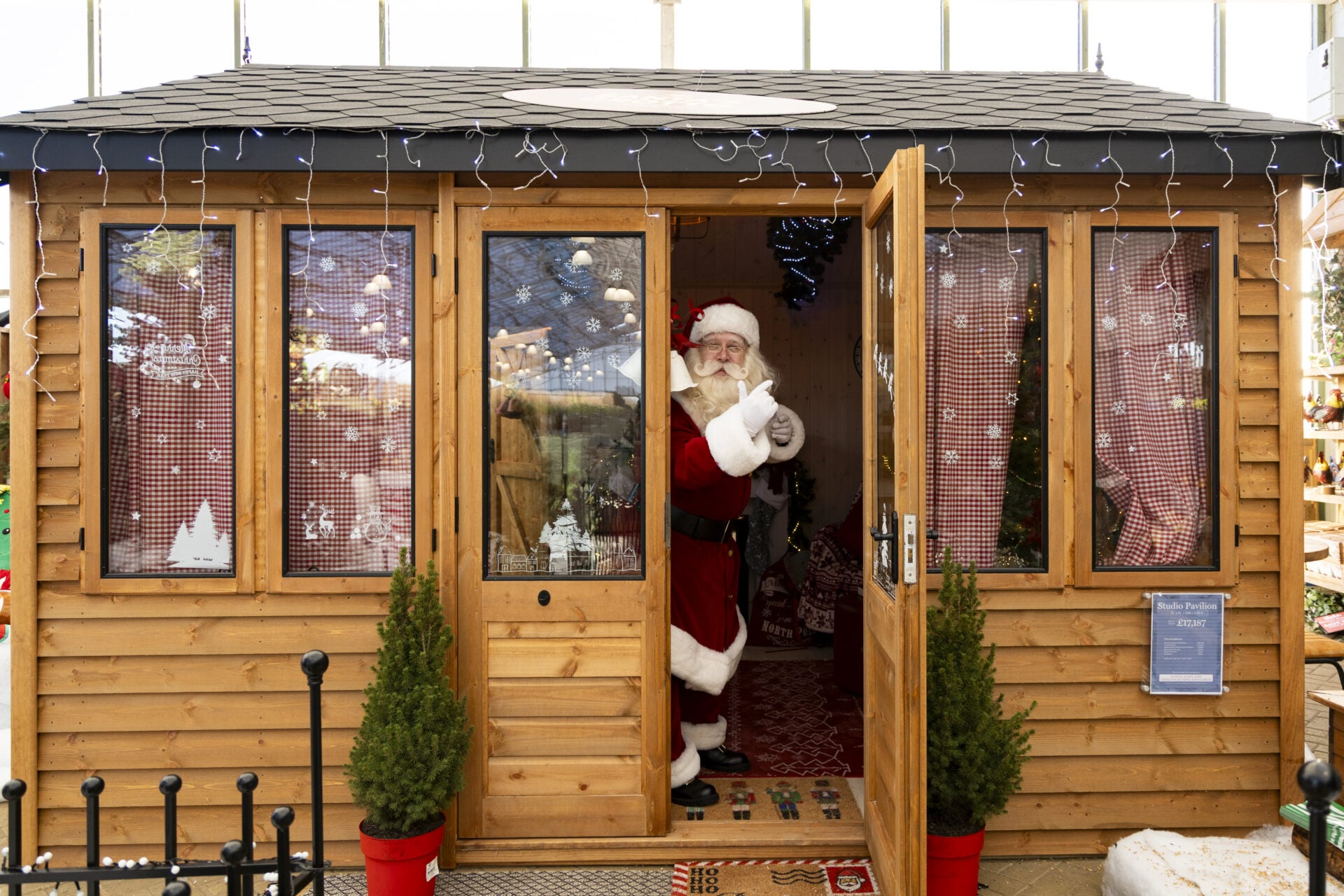 Santa at door to Studio Pavilion being used as a Santa's Grotto.