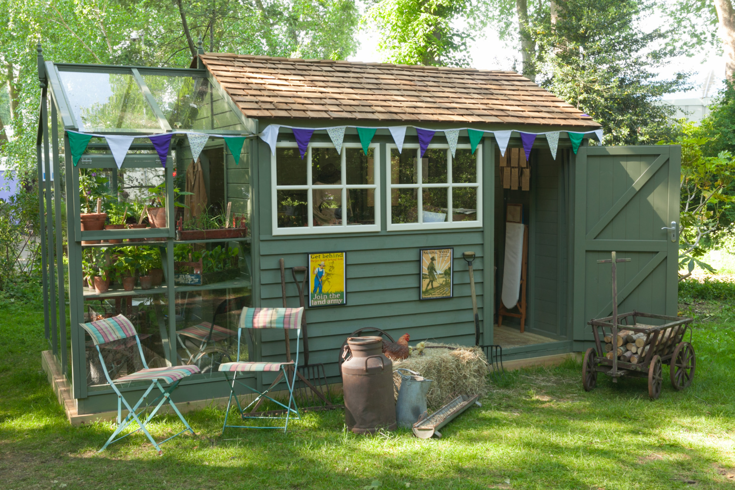 The Women's Land Army exhibit from Chelsea Flower Show 2018. The Holt Fusion garden building is part shed, part greenhouse, making the ideal potting shed.