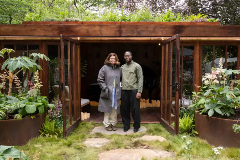 Martha Krempel, designer of "The Composer's Cabin" Houseplant Studio at Chelsea Flower Show 2026, sponsored by Malvern Garden Buildings - pictured with Amiri Harewood