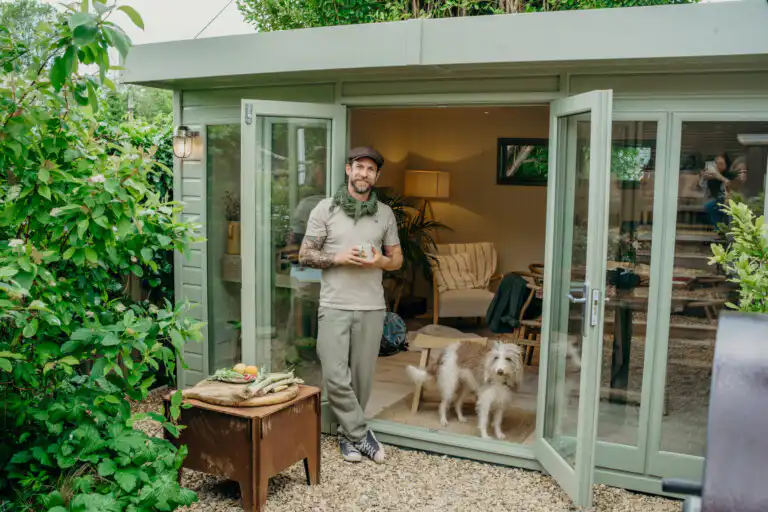 James Strawbridge stands at the door to his Malvern Garden Building