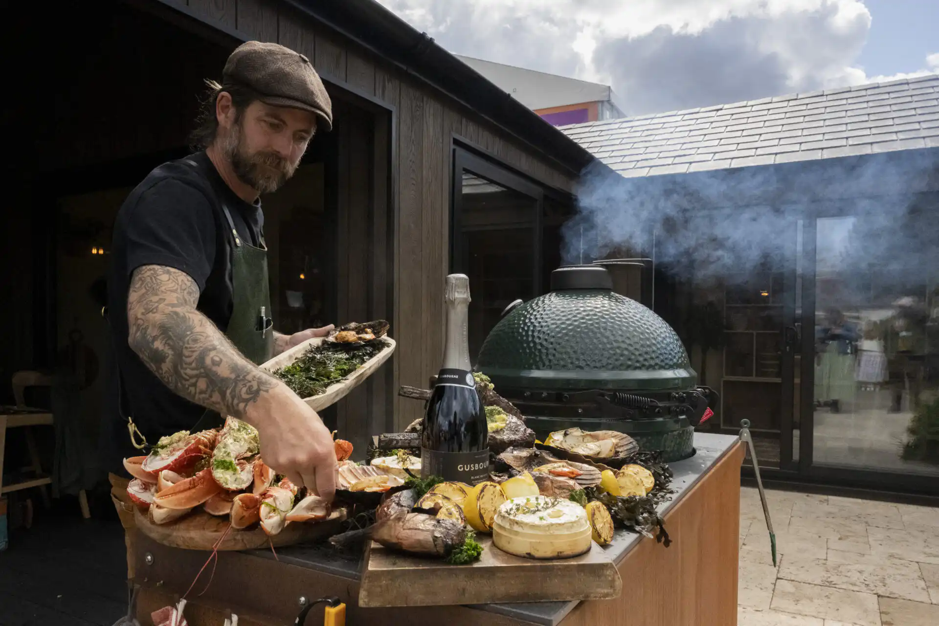 Chef James Strawbridge doing a cooking demo on the Malvern Garden Buildings tradestand at Chelsea Flower Show 2026