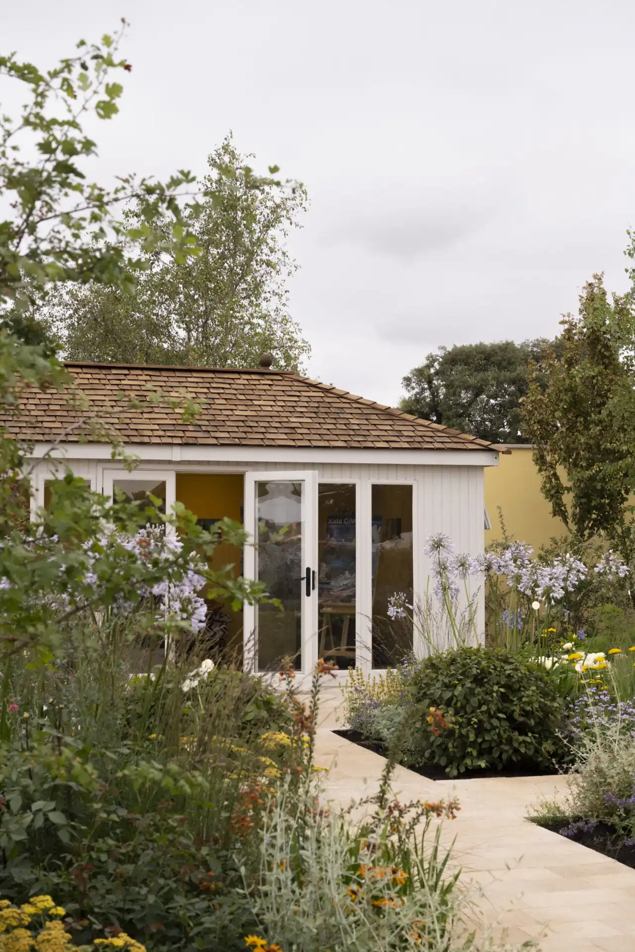 malvern garden buildings studio hipped in show garden at RHS Sandringham flower show