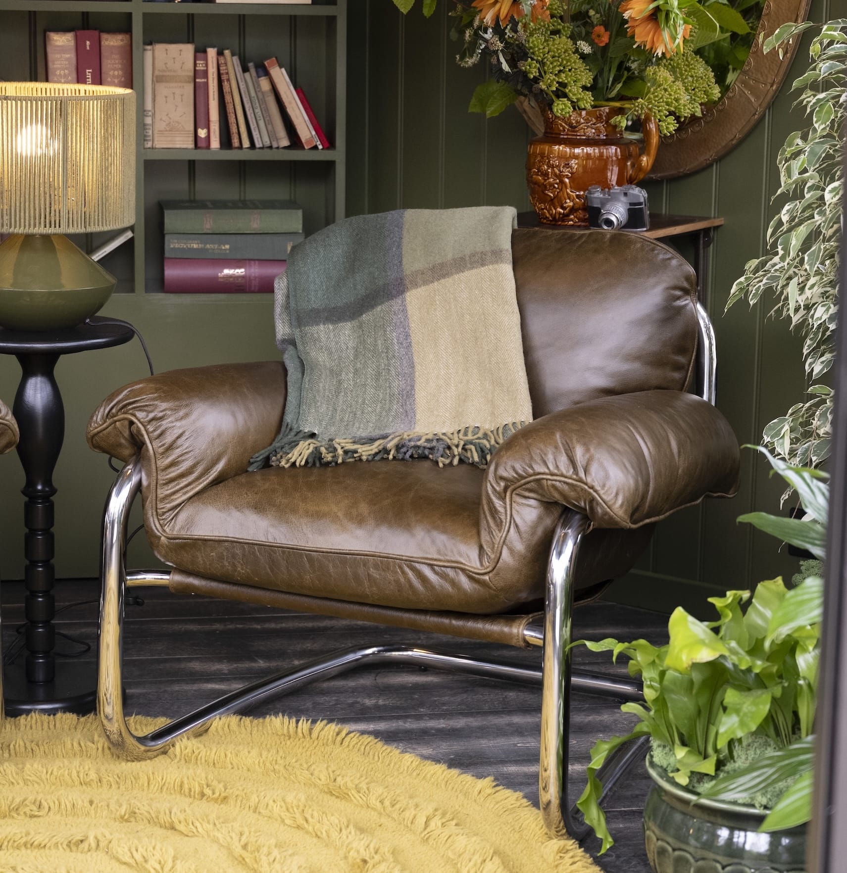 armchair inside hopton building on mgb tradestand at RHS Chselsea