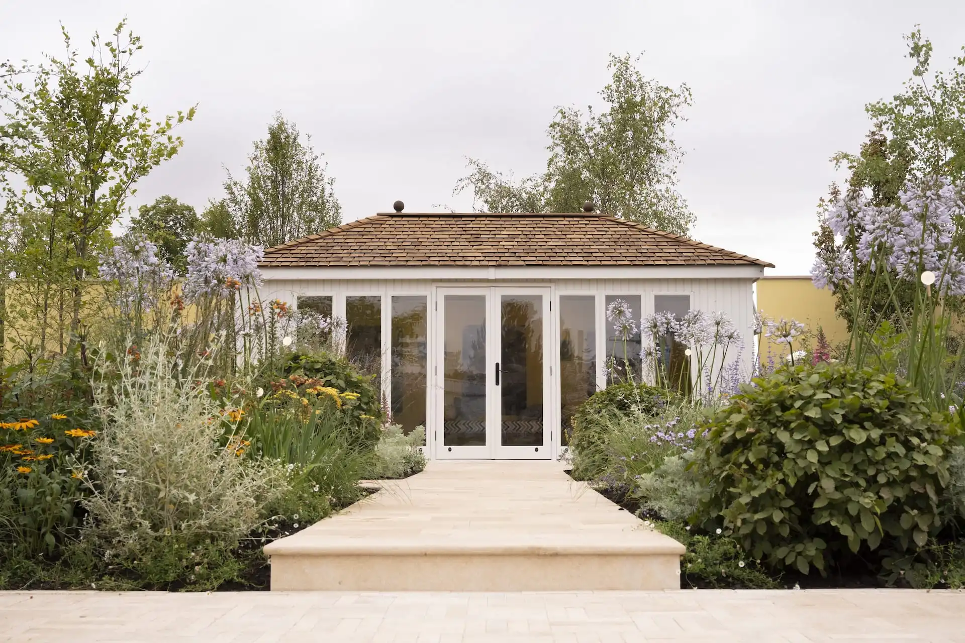 central view of steps leading to malvern garden buildings studio hipped at RHS Sandringham