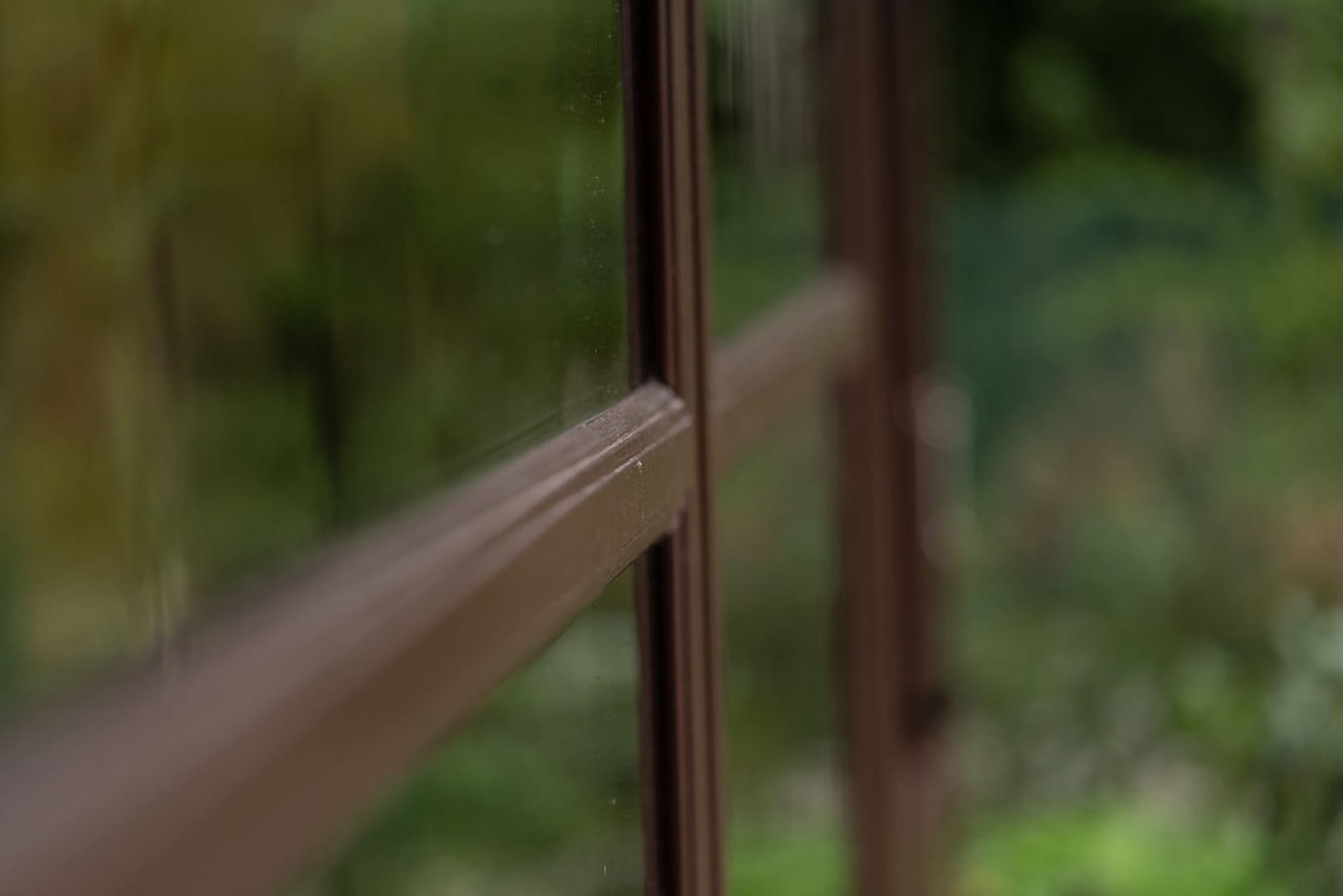 close up view of window of malvern garden buildings shed located at the back of haratios garden