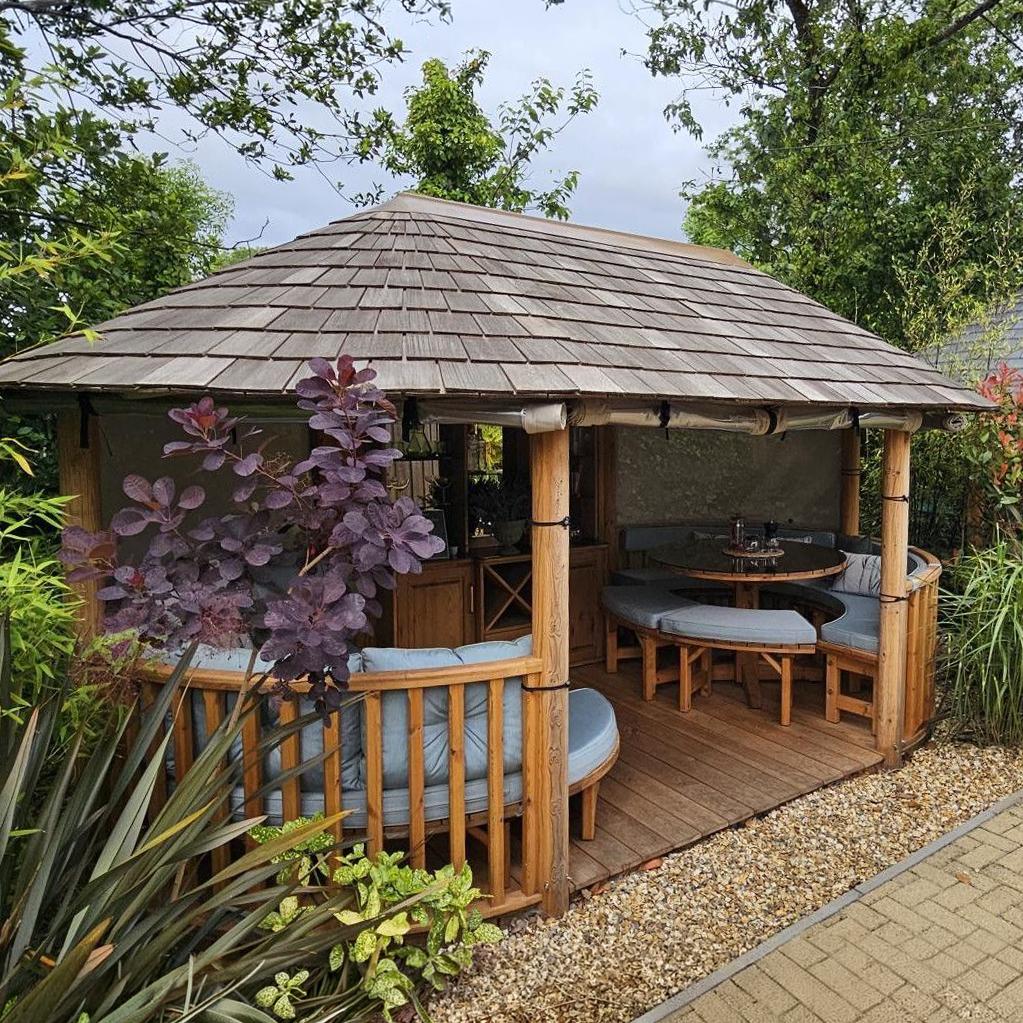 An ex-display Oval Savannah Breeze House, typical of those available in the Malvern Garden Buildings annual Ex-Display Sale