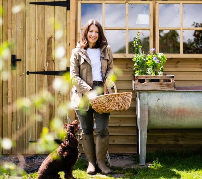 Gemma Leese with dog outside Malvern Apex Shed