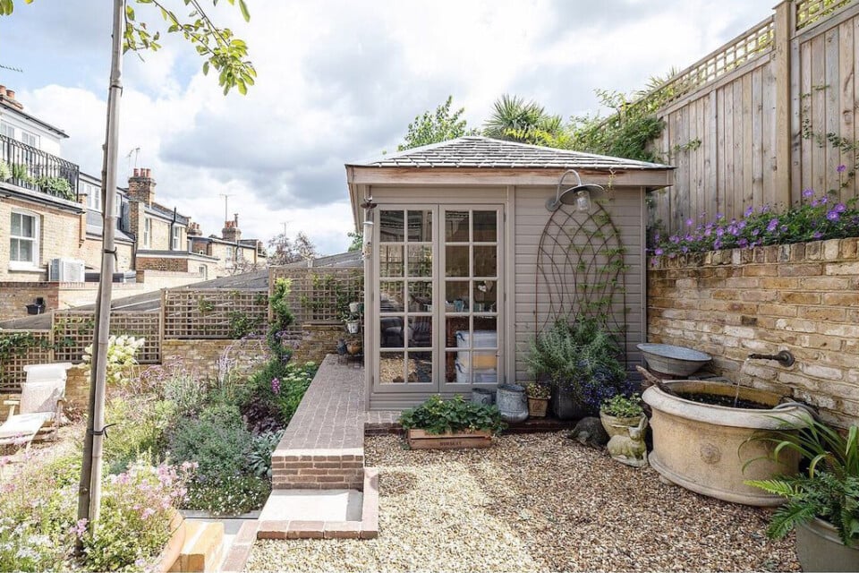 Side view of Kew Garden Room in customer's terrace garden