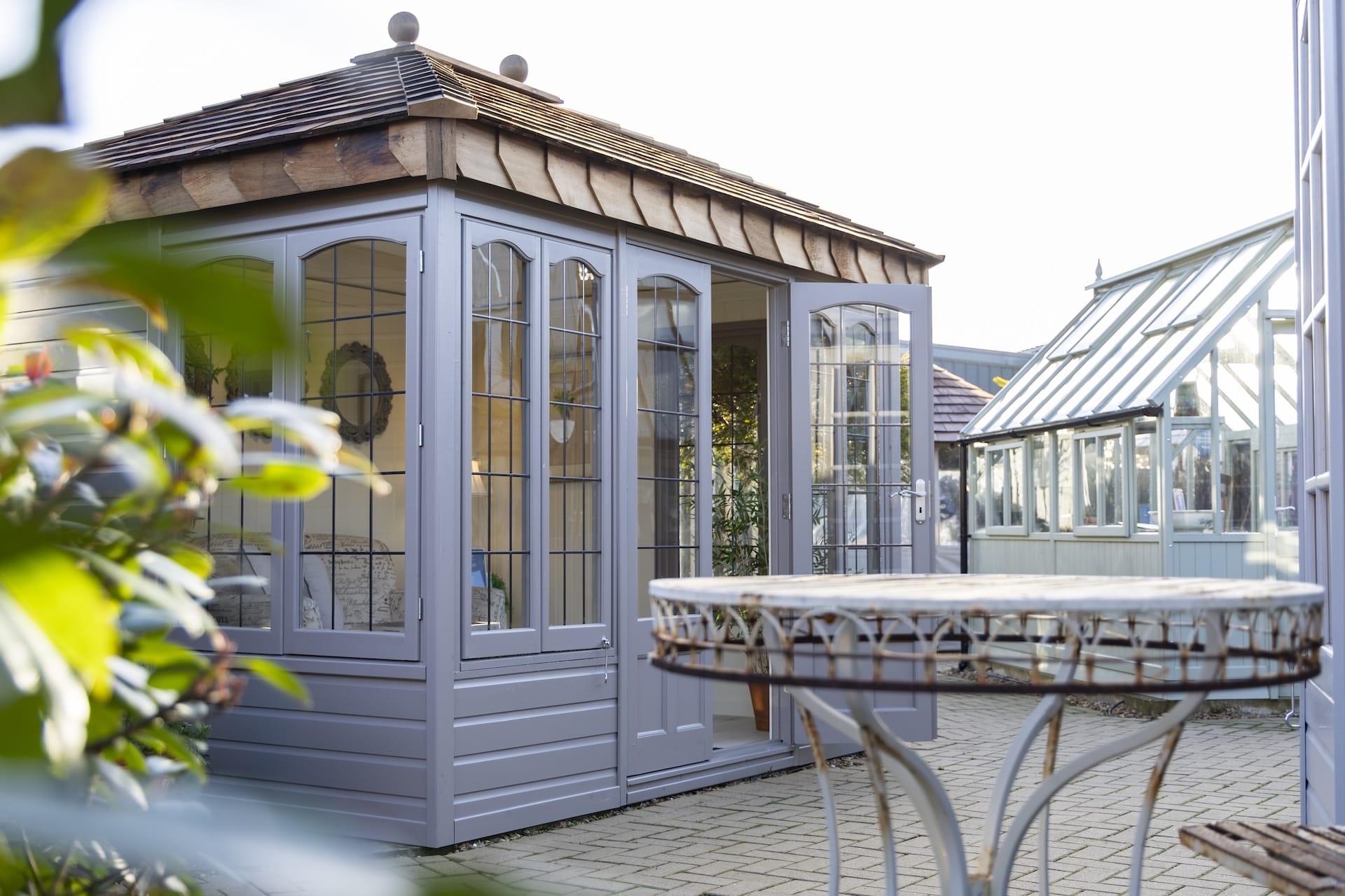 side view of malvern garden buildings ashton with thermowood doors open