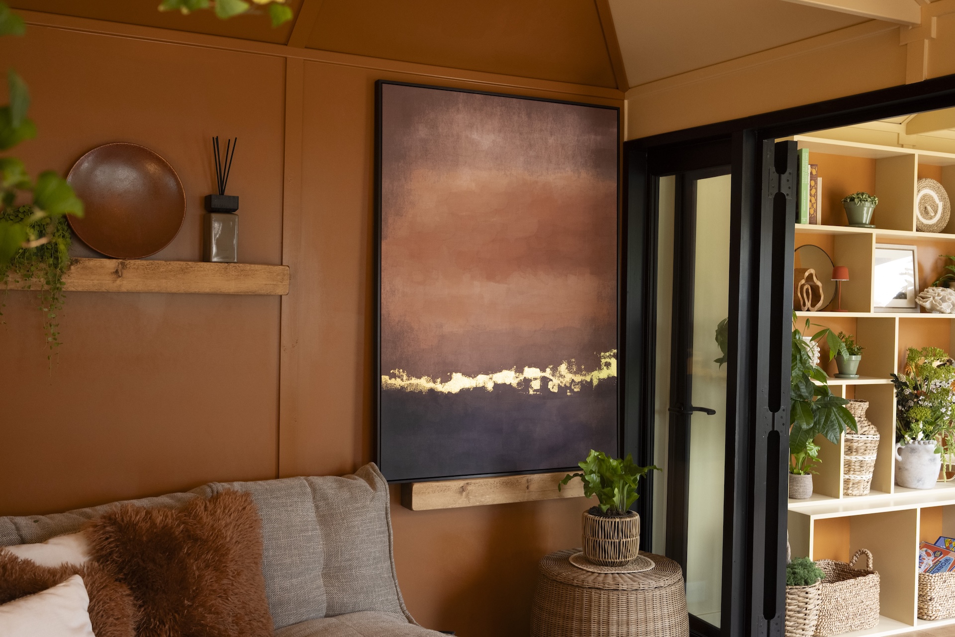 wall canvas from Abigal Ahern inside L Shaped building on mgb tradestand at RHS Chselsea